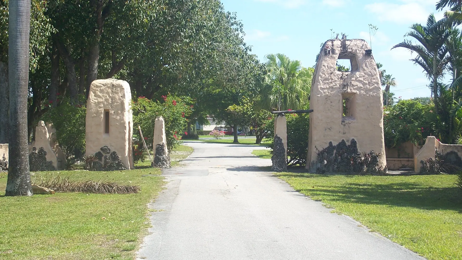 The entrance to the Curtiss Mansion, Miami Springs, framed by Pueblo Revival stone gateposts